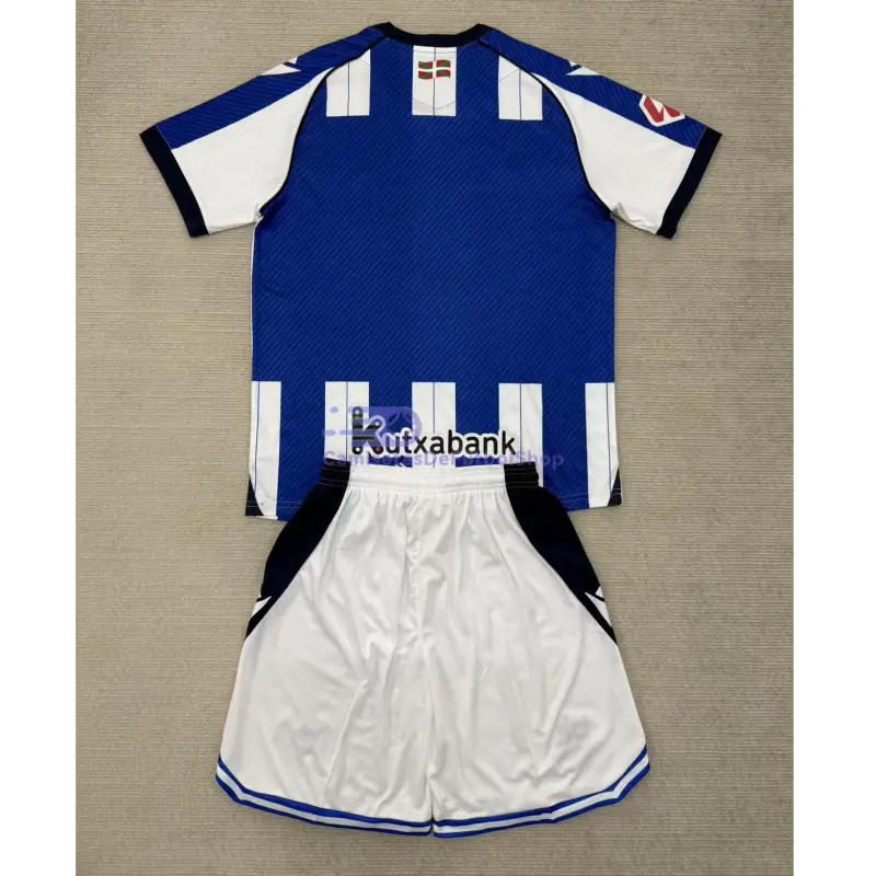 Camiseta Real Sociedad 2025/2026 1ª Equipación  Azul/Blanco Niño Kit con Parche La Liga