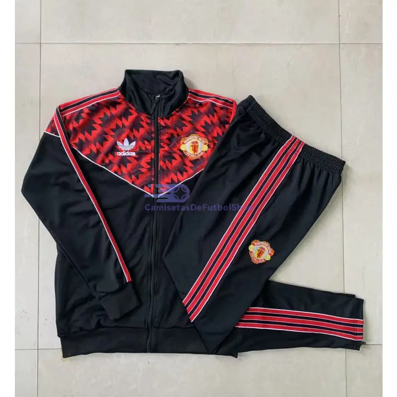 Chandal Manchester United 2025/2026 Niño Negro/Rojo con Estampado