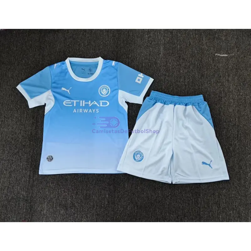 Camiseta Manchester City 2026/2027 1ª Equipación Azul/Blanco Niño Kit